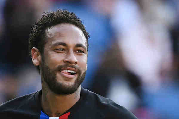 Neymar Jr. posing for a photograph after a football match